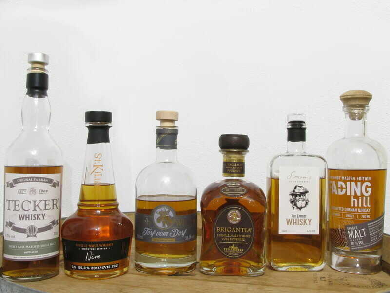 Bild mit Whisky, Tecker, St. Kilian, Elch Whisky,Brigantia, Simon's, Fading Hill
